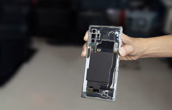 Picture of a smartphone removed from the back, smartphone repair (with clipping path)