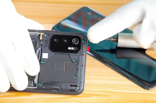 Image of a smartphone removed from the back, smartphone repair