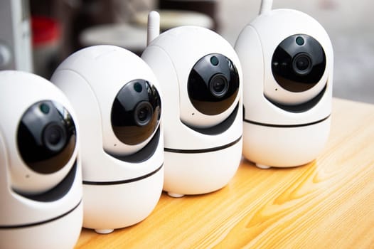 White IP cameras, very popular for security purposes.