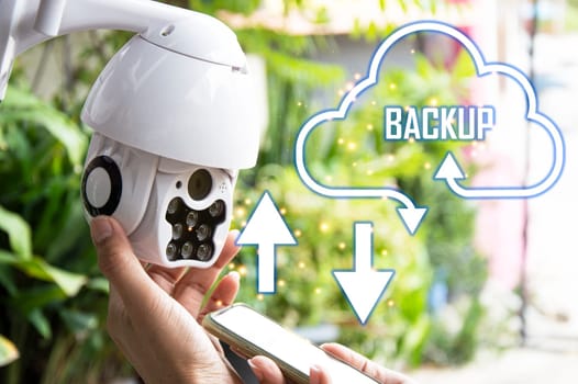 Man installing IP CCTV or high tech surveillance system CCTV system