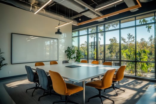 A large conference room with a white board on the wall and a projector. The room is filled with orange chairs and a table. The room is well lit and has a modern feel