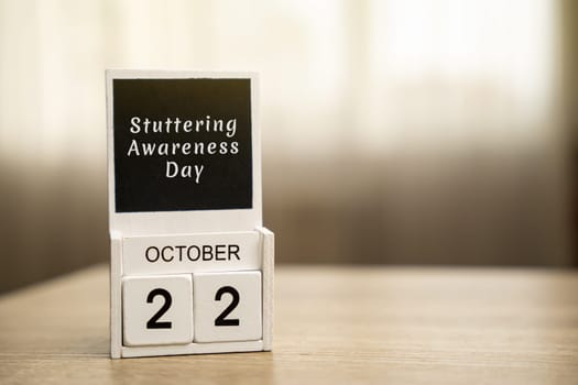 22 october - International Stuttering Awareness Day. Speech disorder. Conceptual image of a calendar with inscription