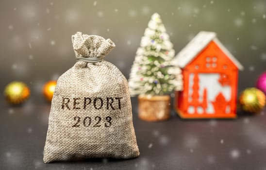 Report 2023 year concept. Business Financial Reporting Concept. Evaluation of the financial position. Balance sheet. Cash flow and audit. Money bag, Christmas tree and red house.