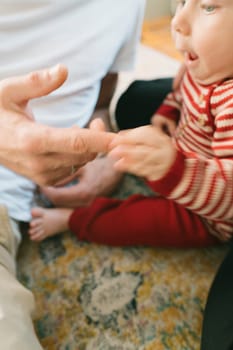 A truly heartwarming moment of connection arises between an adult and a child during their joyful playtime