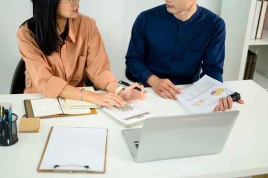 Cropped shot professional team collaborating on financial planning and business strategy.