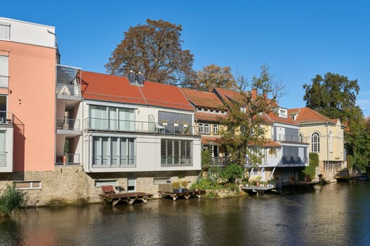 Idyllically situated residential buildings on the River Gera in the city center of Erfurt in the Thuringia region