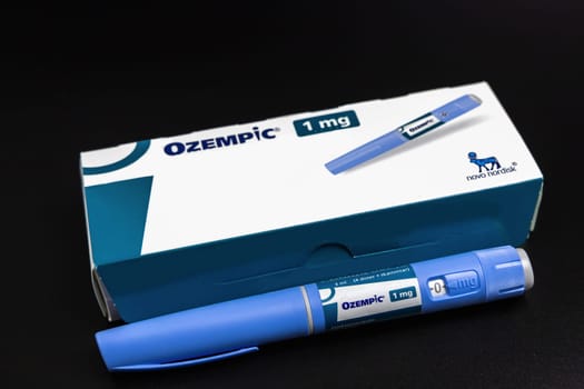 Ozempic Insulin injection pen on a dark background for diabetics and weight loss. Copenhagen, Denmark - January 31, 2025