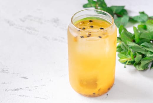 Unique Waltzing Matilda cocktail with passion fruit, gin, sauvignon blanc, orange curacao