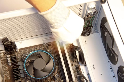 top view mechanic checking computer