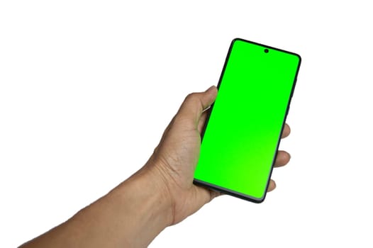 Hand holding a green screen black smartphone on white background,with clipping path
