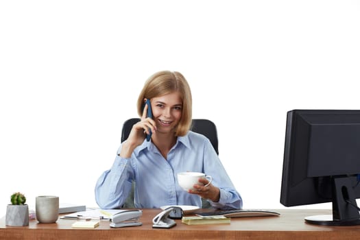 beautiful blonde business woman using phone, drinking coffee in the office