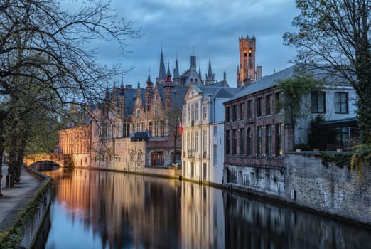 Bridge, canal and old houses in Brugge.