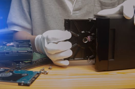 side view Technician installing hard drive