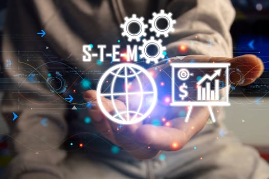 STEM Smart Industrial Technological Innovation concept. Science Technology Engineering Math Industry 5.0. Engineer using virtual touchscreen touched stem icon.	