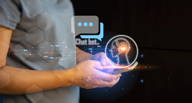 Businessman using robot ai in smartphone intelligence Ai.Chat bot with AI Artificial Intelligence, developed by OpenAI generate. Futuristic technology, robot in online system.
