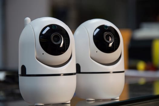 White IP cameras, very popular for security purposes.