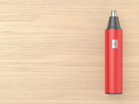Red ear and nose hair trimmer on wooden desk, top view