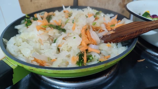 Onion carrot stir-fry pab kitchen food cooking . High quality photo
