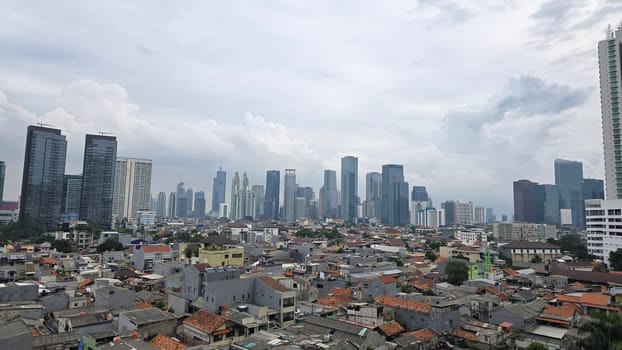 Modern look of a big metropolitan city with illuminated skyscrapers and classic architecture under a clear blue sky. Urban hustle and warm lighting create a vibrant and captivating cityscape. good for multimedia background