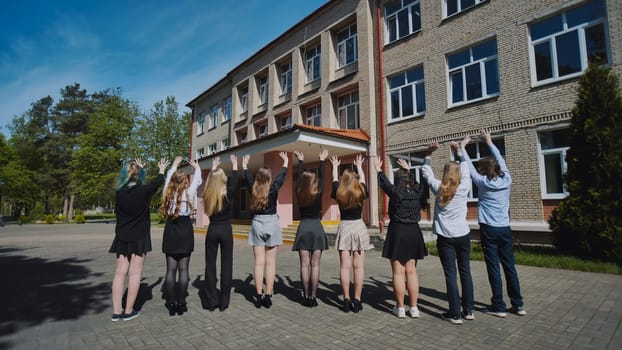 Students joyfully bid farewell to school on their final day, marking the conclusion of the academic year with celebration