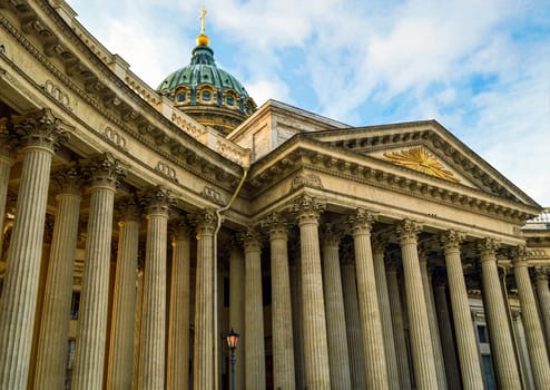 Roof and columns of the Kazan Cathedral on blue sky background in Saint Petersburg, Russia.