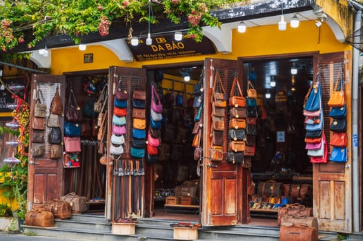 Shop for genuine leather bags and accessories at Hoi An in Street Market in Asia. Hoi An, Vietnam - December 01, 2024