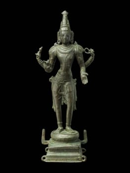 Ancient bronze sculpture of Chakra Purusha, the personified discus weapon of Vishnu, from 10th-century Tamil Nadu, showcasing intricate details and traditional Indian artistry.