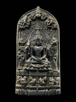 Ancient 12th-century stone sculpture of Shiva as Mrityunjaya, the Conquerer of Death, from Bengal, showcasing intricate carving and spiritual significance in Hindu mythology.