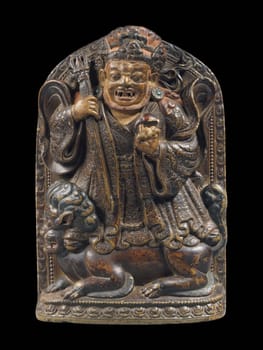 A detailed 15th-century Tibetan Vajrabhairava sculpture, showcasing intricate metalwork and symbolic elements of the tantric deity, set against a neutral background.