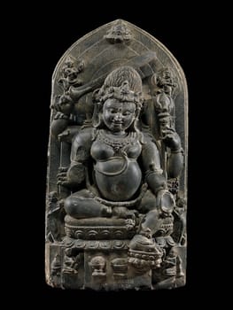 Ancient stone sculpture of Mahakala deity from 11th-12th century Bihar, India, showcasing intricate carving and historical craftsmanship.