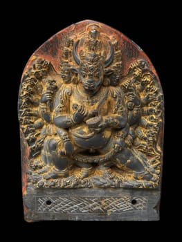 A detailed 15th-century Tibetan sculpture of Vajrabhairava, a wrathful Buddhist deity, showcasing intricate craftsmanship and spiritual symbolism.