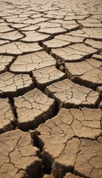 The background of dry cracked earth. The concept of global warming and climate change.