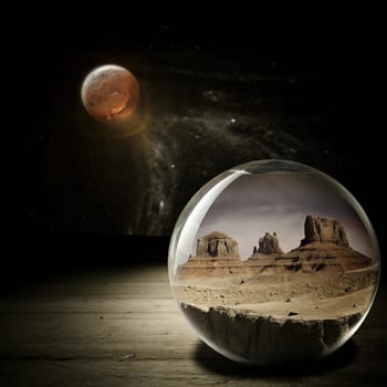 A glass sphere contains a miniature desert landscape, with a planet visible in the background. A high-quality photo.