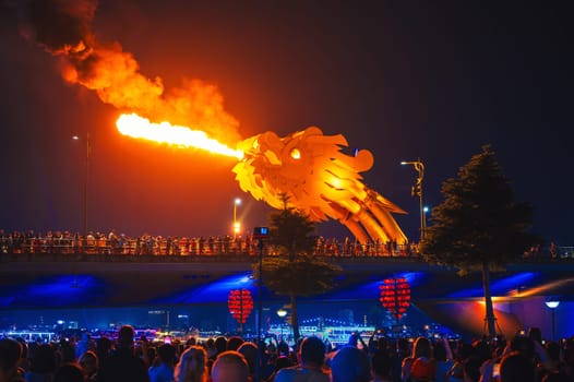 Fire show on Dragon Bridge or Cau Rong Bridge in Da Nang in Vietnam in Asia at night