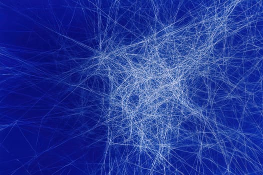 A blue background with a lot of white lines. The lines are all different sizes and shapes. The image has a feeling of chaos and confusion