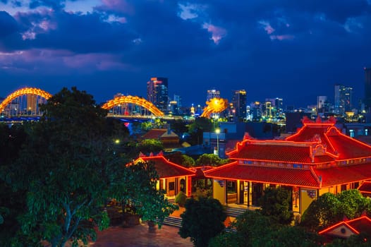 Panorama of Da Nang city with Dragon Bridge in Vietnam in Asia at night