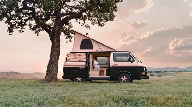 Custom camper van parked in a peaceful countryside field at sunset, inviting you to explore its cozy interior and imagine adventures in nature