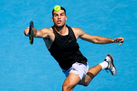 MELBOURNE, AUSTRALIA - JANUARY 09: Carlos Alcarez of Spain practices ahead of the 2025 Australian Open at Melbourne Park on January 9, 2025 in Melbourne, Australia.