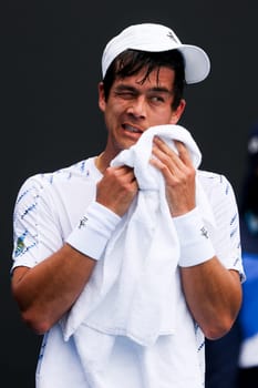 MELBOURNE, AUSTRALIA - JANUARY 09: Mackenzie McDonald of USA in his match against Gauthier Onclin of Belgium in final qualifying for the 2025 Australian Open at Melbourne Park on January 9, 2025 in Melbourne, Australia.