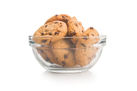 Chocolate chip cookies in bowl isolated on a white background.