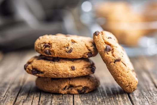 Chocolate chip cookies on a wooden table.
