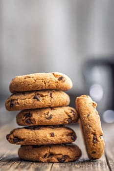 Chocolate chip cookies on a wooden table.