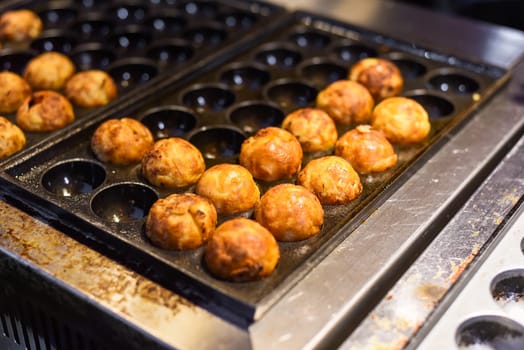 Takoyaki balls in Jalan Alor street food in Kuala Lumpur