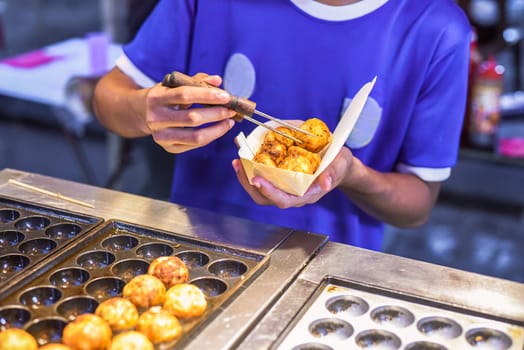 Takoyaki balls in Jalan Alor street food in Kuala Lumpur