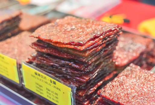 Bbq slice meat pork in the street food Jalan Alor in Kuala Lumpur