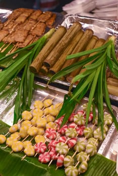 Many snacks and seafood in vietnamese night market in food festival