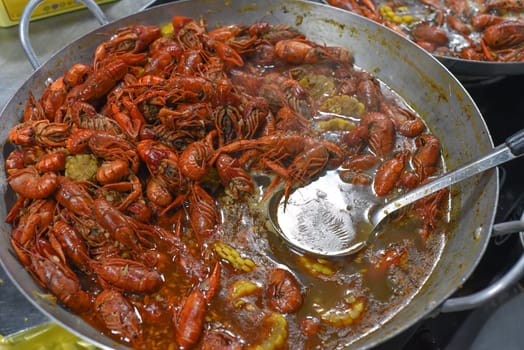Many seafood lobsters in vietnamese night market in food festival
