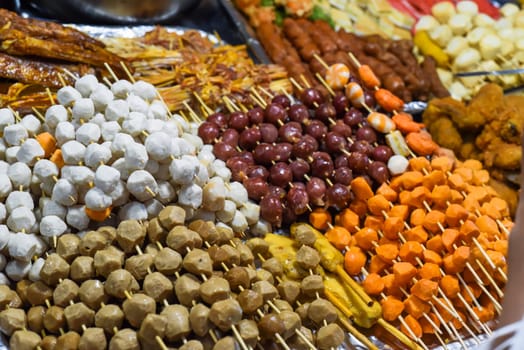 Many snacks and seafood in vietnamese night market in Da Lat