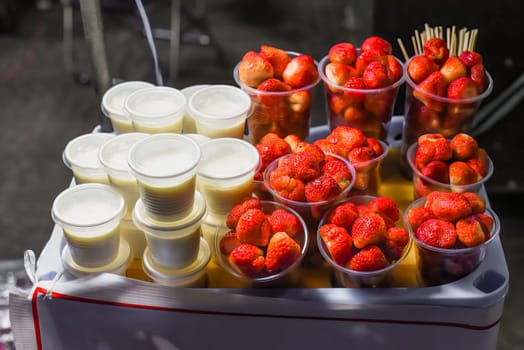 Many fresh natural strawberry and yogurt  in vietnamese night market in Da Lat