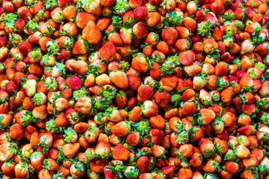 Many fresh natural strawberry in vietnamese night market in Da Lat